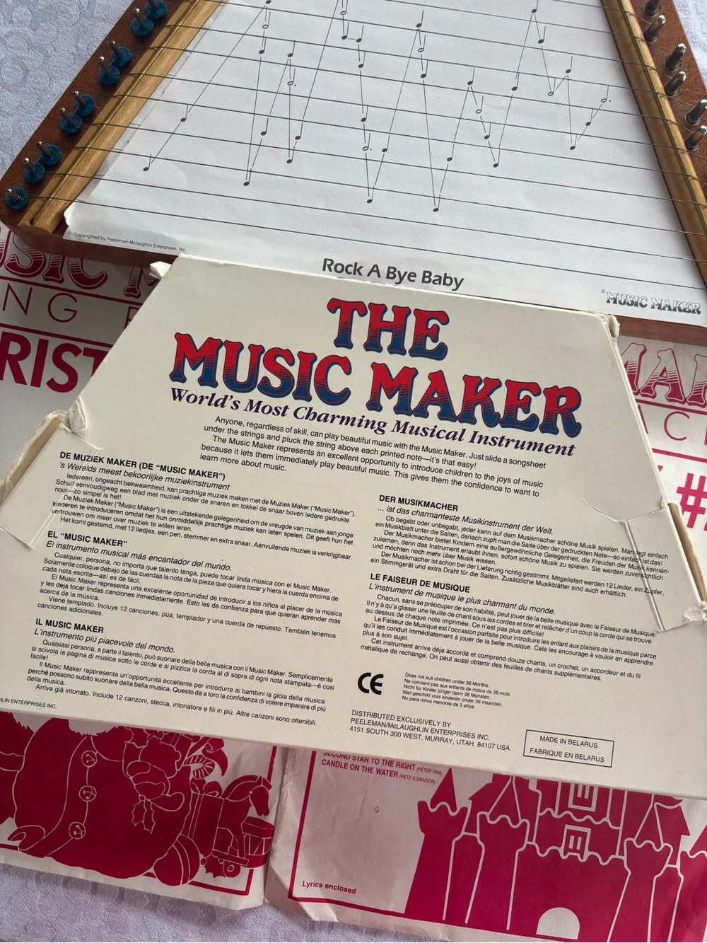 Source Unknown Natural Wood Triangle Music Maker with Red Artwork